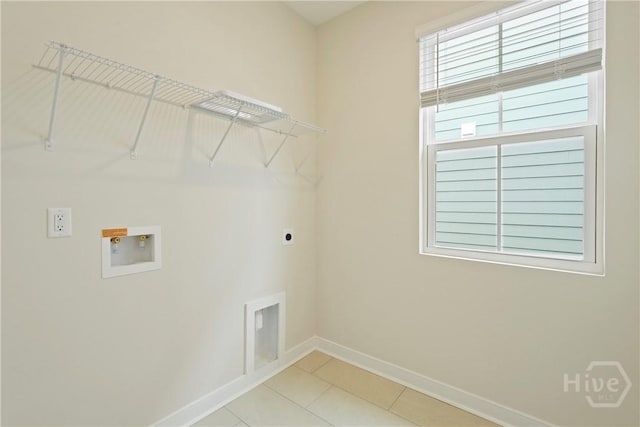 112 Mage St, Savannah, GA 31302 - washroom featuring hookup for a washing machine, hookup for an electric dryer, and light tile patterned floors