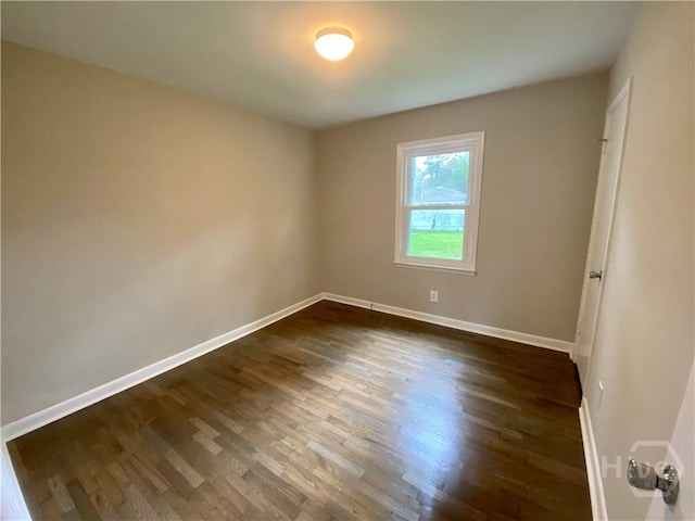 13 Ronnie Ave, Savannah, GA 31408 - spare room with dark wood-style flooring and baseboards