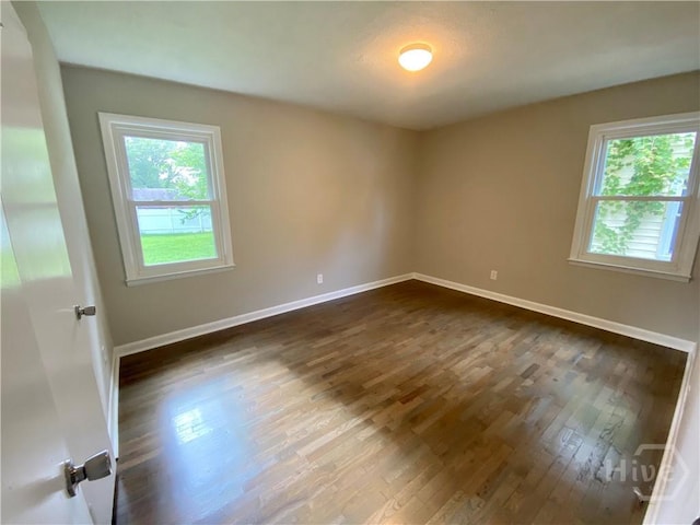 13 Ronnie Ave, Savannah, GA 31408 - empty room with dark wood-type flooring and baseboards