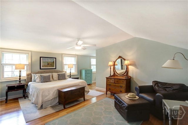 423 E 57th St, Savannah, GA 31405 - bedroom with light wood-style floors, vaulted ceiling, baseboards, and a ceiling fan