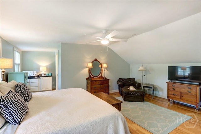 423 E 57th St, Savannah, GA 31405 - bedroom featuring wood finished floors, a ceiling fan, lofted ceiling, and baseboards