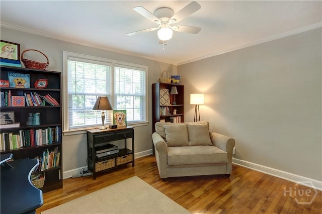 423 E 57th St, Savannah, GA 31405 - living area with a ceiling fan, wood finished floors, baseboards, and crown molding