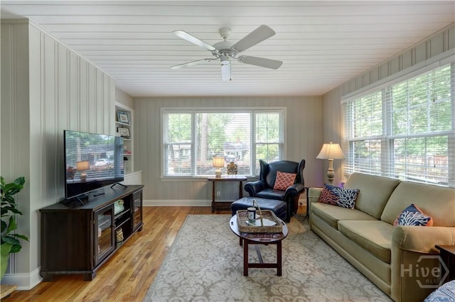 423 E 57th St, Savannah, GA 31405 - living area featuring light wood-style floors, a ceiling fan, and baseboards