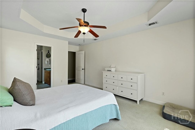 541 Deloach Rd NE, Ludowici, GA 31316 - bedroom with a raised ceiling, carpet floors, baseboards, and a ceiling fan