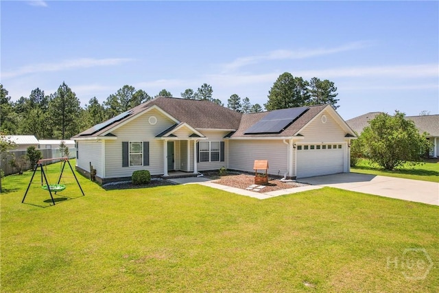 541 Deloach Rd NE, Ludowici, GA 31316 - single story home featuring solar panels, a garage, driveway, and roof with shingles