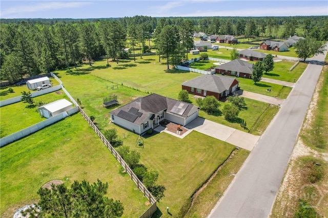 541 Deloach Rd NE, Ludowici, GA 31316 - aerial perspective of suburban area featuring a forest