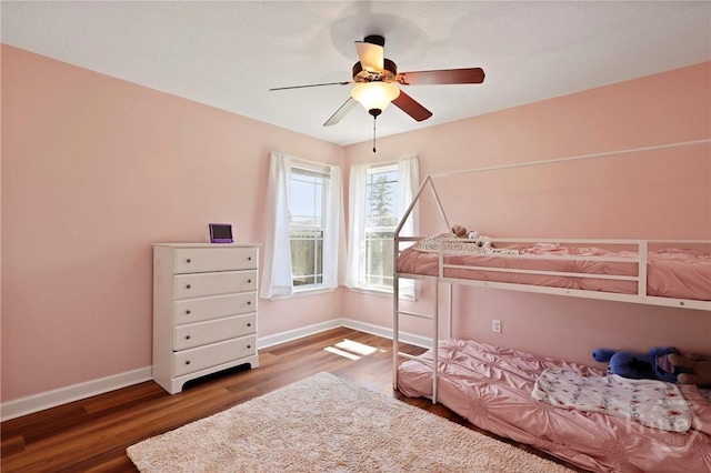 541 Deloach Rd NE, Ludowici, GA 31316 - bedroom featuring wood finished floors, baseboards, and a ceiling fan