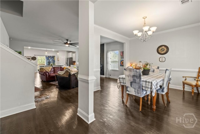 40 Saddlebrush Rd, Ellabell, GA 31308 - dining space with ceiling fan, a chandelier, dark wood-type flooring, and crown molding