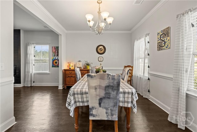40 Saddlebrush Rd, Ellabell, GA 31308 - dining room featuring a chandelier, crown molding, dark wood-style flooring, and baseboards