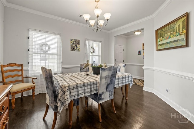 40 Saddlebrush Rd, Ellabell, GA 31308 - dining area featuring dark wood finished floors, a chandelier, crown molding, and baseboards