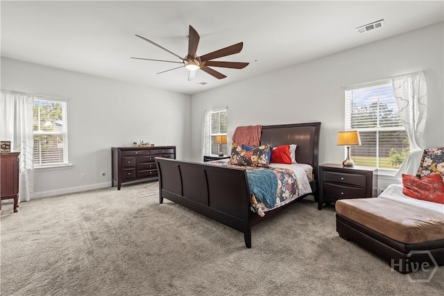 40 Saddlebrush Rd, Ellabell, GA 31308 - bedroom featuring multiple windows, carpet floors, and baseboards