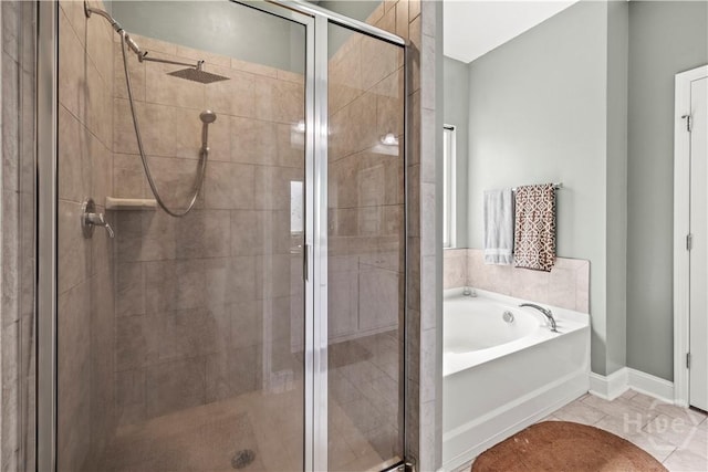 40 Saddlebrush Rd, Ellabell, GA 31308 - bathroom featuring a stall shower, a bath, and baseboards
