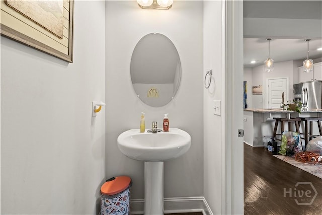 40 Saddlebrush Rd, Ellabell, GA 31308 - bathroom with wood finished floors and baseboards