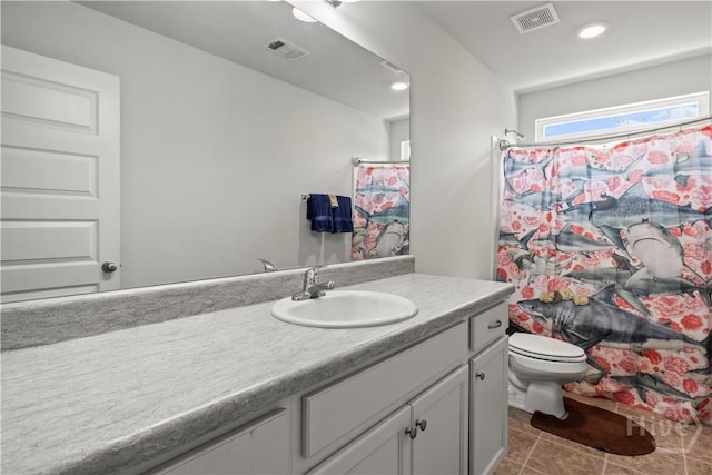40 Saddlebrush Rd, Ellabell, GA 31308 - full bathroom with vanity, tile patterned flooring, toilet, a shower with shower curtain, and recessed lighting