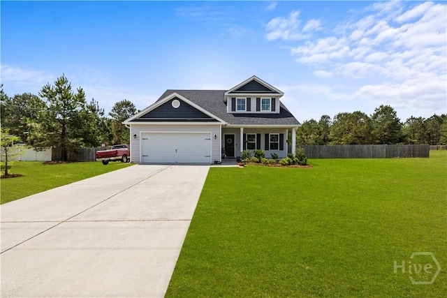 40 Saddlebrush Rd, Ellabell, GA 31308 - view of front of house featuring driveway, an attached garage, and a porch