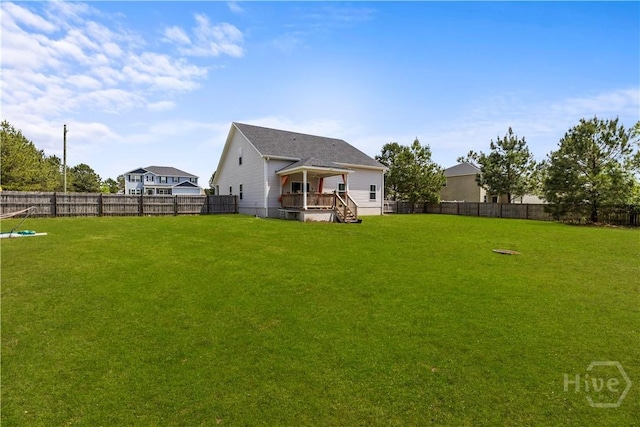 40 Saddlebrush Rd, Ellabell, GA 31308 - back of property with a wooden deck