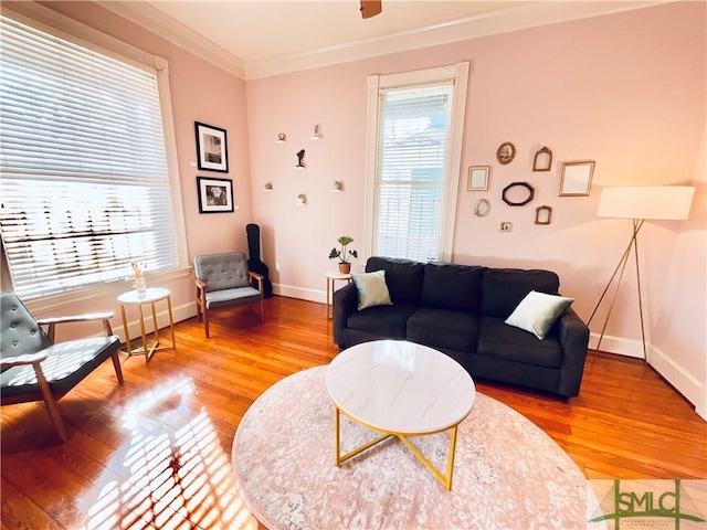 2203 Barnard St, Savannah, GA 31401 - living area with crown molding, baseboards, and light wood-type flooring