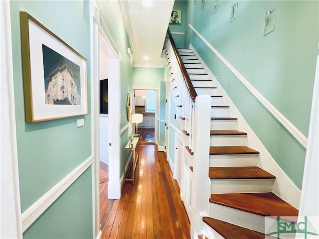 2203 Barnard St, Savannah, GA 31401 - staircase with wood-type flooring, ornamental molding, and baseboards