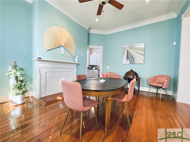 2203 Barnard St, Savannah, GA 31401 - dining room featuring crown molding, a ceiling fan, hardwood / wood-style flooring, baseboards, and recessed lighting