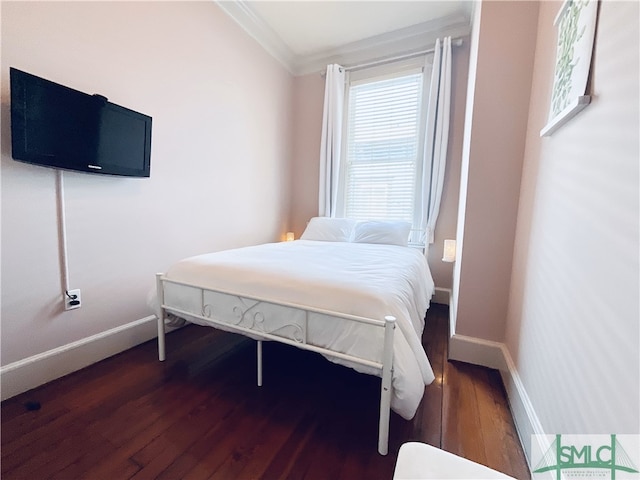 2203 Barnard St, Savannah, GA 31401 - bedroom featuring crown molding, baseboards, and wood finished floors