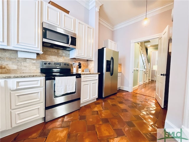 2203 Barnard St, Savannah, GA 31401 - kitchen featuring appliances with stainless steel finishes, ornamental molding, backsplash, white cabinetry, and baseboards