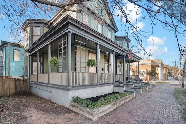 2203 Barnard St, Savannah, GA 31401 - view of side of property featuring covered porch