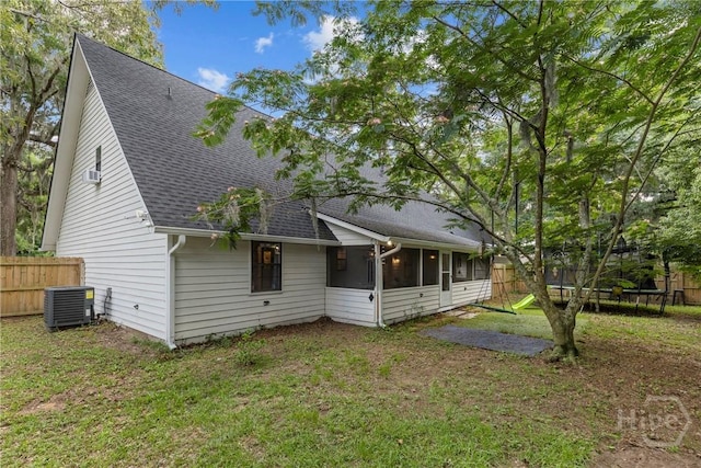 107 Rose Dhu Way, Savannah, GA 31419 - back of property with roof with shingles, a trampoline, a sunroom, and central AC