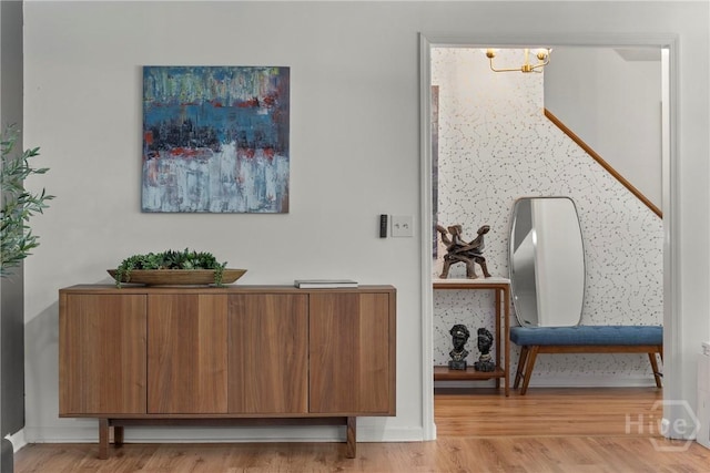 107 Rose Dhu Way, Savannah, GA 31419 - detailed view of a chandelier, wood finished floors, and baseboards
