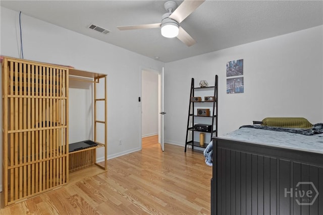 107 Rose Dhu Way, Savannah, GA 31419 - bedroom with light wood-style floors, baseboards, and ceiling fan