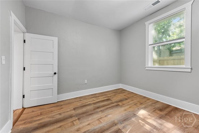 1825 Lloyd St, Savannah, GA 31405 - unfurnished room with wood finished floors and baseboards