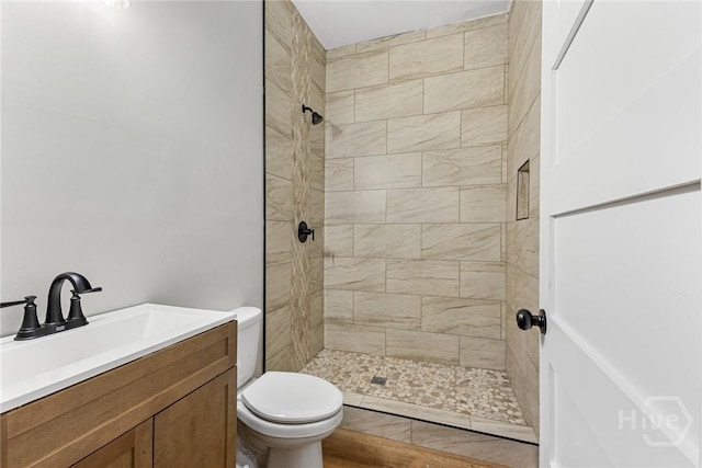 1825 Lloyd St, Savannah, GA 31405 - bathroom with tiled shower, toilet, and vanity
