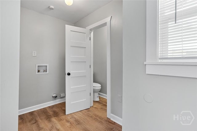 1825 Lloyd St, Savannah, GA 31405 - laundry area featuring hookup for a washing machine, wood finished floors, and baseboards