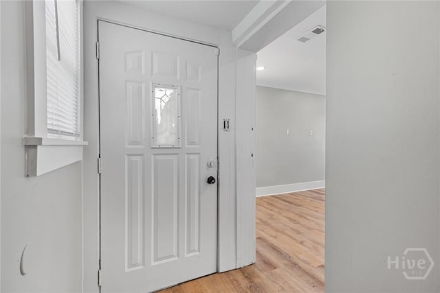 1825 Lloyd St, Savannah, GA 31405 - foyer featuring light wood-style flooring and baseboards