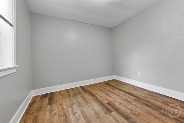 1825 Lloyd St, Savannah, GA 31405 - unfurnished room featuring wood finished floors and baseboards