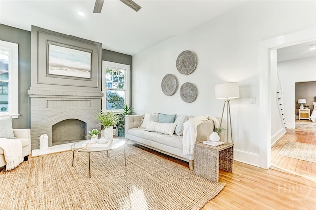 1001 Maupas Ave, Savannah, GA 31401 - living area with light wood-type flooring, ceiling fan, baseboards, a fireplace, and recessed lighting