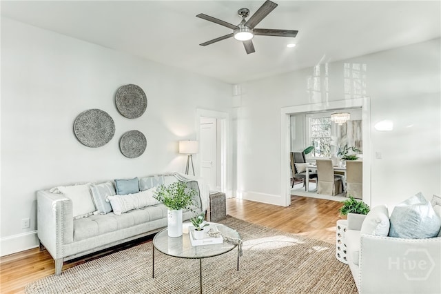1001 Maupas Ave, Savannah, GA 31401 - living room featuring ceiling fan, wood finished floors, and baseboards