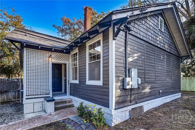 1001 Maupas Ave, Savannah, GA 31401 - view of side of home with a chimney and crawl space