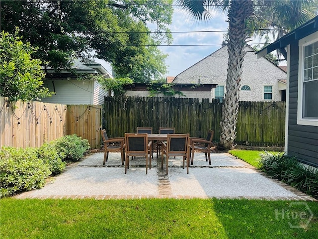 1001 Maupas Ave, Savannah, GA 31401 - fenced backyard featuring a patio area