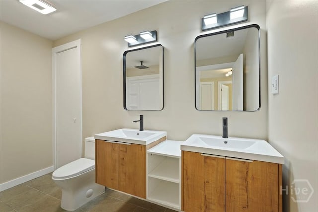 40 Circle Dr, Pembroke, GA 31321 - bathroom featuring two vanities and tile patterned floors