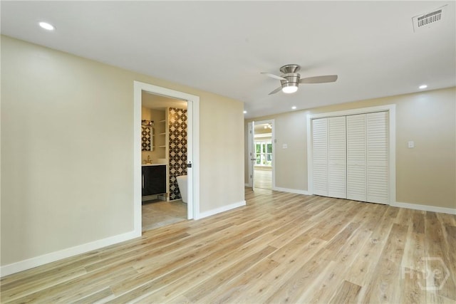 40 Circle Dr, Pembroke, GA 31321 - unfurnished bedroom featuring light wood finished floors, a closet, ensuite bathroom, a ceiling fan, and recessed lighting