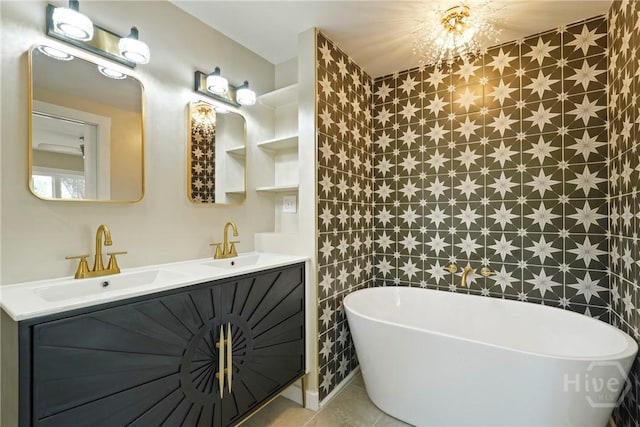 40 Circle Dr, Pembroke, GA 31321 - full bath featuring a freestanding bath, double vanity, and tile patterned flooring