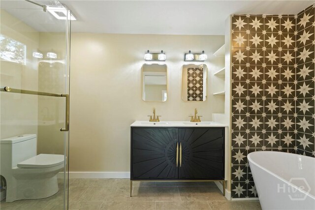 40 Circle Dr, Pembroke, GA 31321 - full bath with a freestanding bath, double vanity, and a shower with door