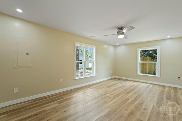 40 Circle Dr, Pembroke, GA 31321 - spare room featuring electric panel, plenty of natural light, a ceiling fan, light wood finished floors, and recessed lighting