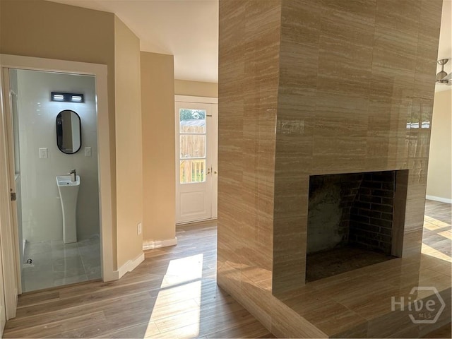40 Circle Dr, Pembroke, GA 31321 - hall featuring baseboards and wood finished floors