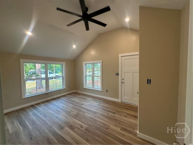 40 Circle Dr, Pembroke, GA 31321 - unfurnished living room featuring a ceiling fan, wood finished floors, vaulted ceiling, and recessed lighting