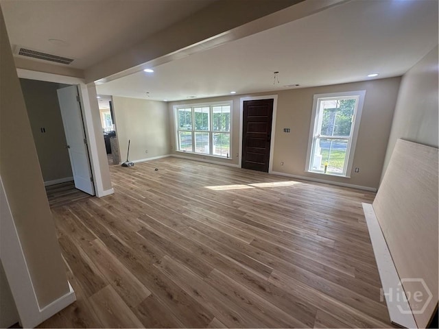 40 Circle Dr, Pembroke, GA 31321 - unfurnished living room featuring wood finished floors and recessed lighting