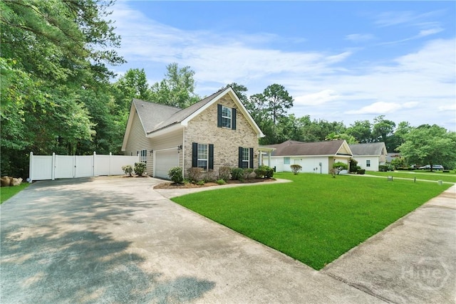 201 Henderson Oaks Dr, Savannah, GA 31419 - traditional-style home featuring brick siding, concrete driveway, a gate, and a garage
