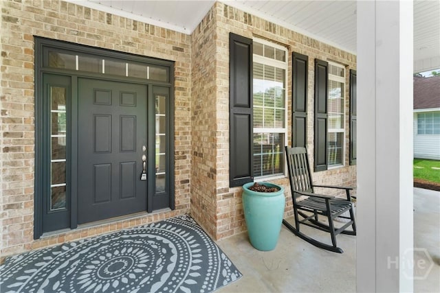 201 Henderson Oaks Dr, Savannah, GA 31419 - view of exterior entry featuring covered porch and brick siding