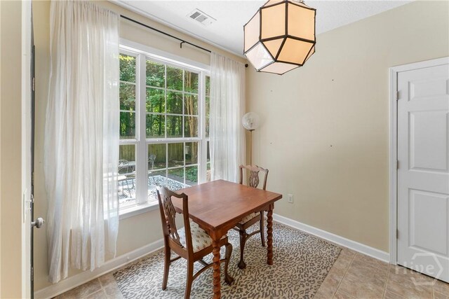 201 Henderson Oaks Dr, Savannah, GA 31419 - dining area featuring plenty of natural light, baseboards, and light tile patterned floors
