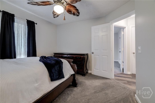 19 S Lake Dr, Savannah, GA 31410 - bedroom with carpet, a ceiling fan, and baseboards